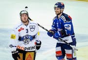 Es ist der 27. Januar 2015, als in den Gesichtern von Zugs Stürmer Nolan Diem (links) und ZSC-Flügel Patrik Bärtschi die Entwicklung des Spiels abzulesen ist. (Bild: Keystone/Steffen Schmidt)