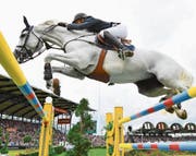 Nullfehlerritt und eine schnelle Zeit: der belgische Sieger Gregory Wathelet auf Corée. (Bild: Uwe Anspach/Keystone (Aachen, 23. Juli 2017))