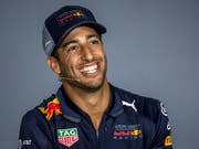 Daniel Ricciardo hat nach seiner Bestzeit allen Grund zum Strahlen (Bild: KEYSTONE/EPA/SRDJAN SUKI)