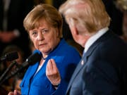 Die deutsche Kanzlerin Angela Merkel und US-Präsident Donald Trump an einer gemeinsamen Medienkonferenz in Washington. (Bild: Keystone/EPA/JIM LO SCALZO)
