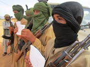 Dem Uno-Kinderhilfswerk Unicef zufolge gehörten derzeit etwa 19'000 Kinder bewaffneten Gruppen im Südsudan an. (Bild: KEYSTONE/AP/BABA AHMED)