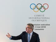 Das IOC um Präsident Thomas Bach will die nachträglichen Medaillengewinner im Nachhinein ehren (Bild: KEYSTONE/JEAN-CHRISTOPHE BOTT)