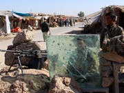 Von Nato-Truppen ausgebildete afghanische Sicherheitskräfte in der Region Helmand: Die USA haben ihr militärisches Vorgehen verstärkt, doch bisher ohne nennenswerten Erfolg. (Bild: KEYSTONE/EPA/WATAN YAR)