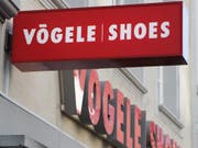Die Vertriebsformate Vögele Shoes, Bingo Shoe Discount und MAX Shoes werden beibehalten. (Bild: Keystone/STEFFEN SCHMIDT)