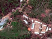 Das nordkoreanische Atomtestgelände Punggye Ri in einer Luftaugfnahme. Das Gelände wurde von Nordkorea laut Medienberichten unbrauchbar gemacht. (Bild: Keystone/AP/)