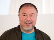 Der chinesische Künstler Ai Weiwei verlässt nach drei Jahren seine Wahlheimat Berlin. Er beherrscht die Sprache nicht und vermisst die Sonne. (Bild: Keystone/APA/APA/GEORG HOCHMUTH)