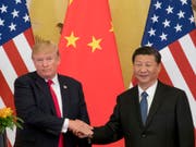 China bemängelt die Vorgehensweise von US-Präsident Donald Trump (links) bei der Verhängung neuer Strafzölle. (Bild: KEYSTONE/AP/ANDREW HARNIK)