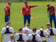 Herkulesaufgabe: Stanislaw Tschertschessow (Mitte) soll Russland an der Heim-WM zum Erfolg coachen (Bild: KEYSTONE/EPA EXPA/JAKOB GRUBER)