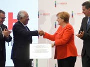 Der portugiesische Ministerpräsident Costa und die deutsche Kanzlerin Merkel bei der Einweihung eines Entwicklungs- und Technologiezentrums des Konzerns Bosch. (Bild: KEYSTONE/EPA LUSA/HUGO DELGADO)