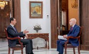 Der syrische Machthaber Baschar al-Assad (links) im Interview mit dem russischen Staatssender Russia Today. (Bild: EPA/Syrian Arab News Agency (Damaskus, 30. Mai 2018))