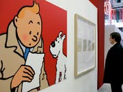 Eine Zeichnung der Comic-Figuren Tim und Struppi ist für viel Geld unter den Hammer gekommen. (Symbolbild) (Bild: KEYSTONE/AP/JACQUES BRINON)