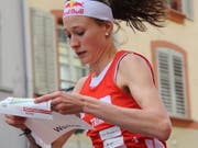 Judith Wyder liest in vollem Lauf die Karte (Archivaufnahme) (Bild: KEYSTONE/SWISS ORIENTEERING/REMY STEINEGGER)