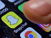 Das soziale Netzwerk Snapchat tritt den EU-Regeln für Jugendschutz und gegen Hassreden bei. (Bild: KEYSTONE/EPA/SASCHA STEINBACH)
