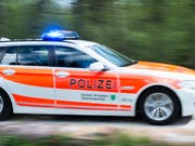 Nach Schüssen in Gossau SG entdeckte die Polizei in der Wohnung eines Mehrfamilienhauses einen toten Mann. (KEYSTONE/Gian Ehrenzeller) (Bild: KEYSTONE/GIAN EHRENZELLER)