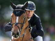 Beat Mändli und Dsarie fokussieren ihren Blick auf das Hindernis (Bild: KEYSTONE/ENNIO LEANZA)
