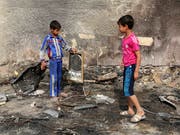 Trotz eines Rückgangs der Gewalt im Irak ist die Dschihadistenmiliz "Islamischer Staat" (IS) weiterhin in der Lage, Anschläge zu verüben. (Bild: KEYSTONE/AP/KARIM KADIM)