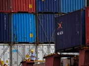 Der Handelsstreit zwischen China und den USA dürfte sich mittelfristig auch auf den Welthandel negativ auswirken. (Bild: KEYSTONE/AP/ANDY WONG)