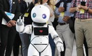 Roboter an der Cebit. Bild: Focke Strangmann/EPA (Hannover, 12. Juni 2018)