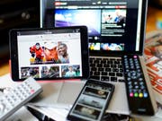 Die Frage, ob Online-Medien für Audio- und Videoangebote Geld aus der Medienabgabe erhalten sollen, ist unter den Parteien umstritten. (Bild: KEYSTONE/JEAN-CHRISTOPHE BOTT)