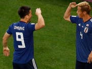 Torschütze Keisuke Honda (rechts) und Shinji Okazaki feiern Japans 2:2 (Bild: Keystone/EPA/ROMAN PILIPEY)