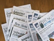 Es dauert noch bis zum gemeinsamen Joint-Venture: Die Wettbewerbskommission (Weko) will den Zusammenschluss der Regionalmedien der NZZ-Gruppe sowie deren Online-Portale mit den AZ Medien noch vertieft prüfen. (Bild: KEYSTONE/CHRISTIAN BEUTLER)