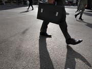 Banken und Behörden auf dem Schweizer Finanzplatz sind bei der Prävention und der Identifizierung krimineller finanzieller Aktivitäten gefordert. (Bild: KEYSTONE/GAETAN BALLY)