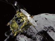 Die japanische Raumsonde «Hayabusa2» hat am Mittwoch ihr Ziel im All erreicht. (Simulationsbild) (Bild: KEYSTONE/AP JAXA)