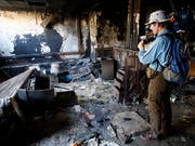 Einer der Verantwortlichen des Anschlags auf das US-Konsulat in Bengasi in Libyen ist in den USA zu einer langen Haftstrafe verurteilt worden. (Symbolbild verwüstete US-Einrichtungen in Libyen) (Bild: KEYSTONE/AP/FRANCOIS MORI)