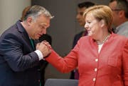 Der ungarische Premierminister Viktor Orbán und die deutsche Kanzlerin Angela Merkel. Bild: Stephanie Lecocq/EPA (Brüssel, 29. Juni 2018)