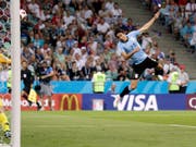 Zwei Tore und dann die Verletzung: Edinson Cavani bringt Uruguay in die Viertelfinals und muss selber um die Teilnahme bangen (Bild: KEYSTONE/AP/ANDREW MEDICHINI)