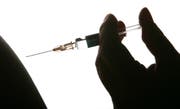 Vor der Reise in zahlreiche Länder ratsam: Eine Hepatitits-A-Impfung. (Keystone)