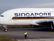 Ein deutscher Fondsanbieter will zwei Airbus A380, die Singapore Airlines geleast hatte, als Ersatzteillager verscherbeln. (Bild: KEYSTONE/EPA/GUILLAUME HORCAJUELO)