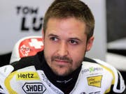 Zukunft geregelt: Tom Lüthi kann sich wieder auf das sportliche Geschehen konzentrieren (Bild: KEYSTONE/EPA/EDDY LEMAISTRE)