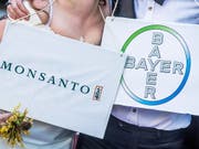 Die Übernahme von Monsanto durch Bayer ist in trockenen Tüchern (Archivbild). (Bild: KEYSTONE/EPA/STEPHANIE LECOCQ)