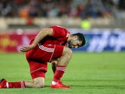 Irans Nationalspieler Mehdi Taremi und seine Teamkollegen werden an der WM aufgrund der Wirtschaftssanktionen der USA nicht in ihren gewohnten Nike-Schuhen auflaufen können (Bild: KEYSTONE/AP/EBRAHIM NOROOZI)