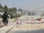 Trümmerfeld nach einer Bombenexplosion in der afghanischen Stadt Kandahar im Mai. Urheber sollen die radikalislamischen Taliban sein. (Bild: KEYSTONE/EPA/MUHAMMAD SADIQ)