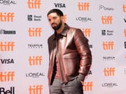 Über 300 Downloads innert 24 Stunden: Der kanadische Rapper Drake landete einen neuen Streaming-Rekord. (Bild: KEYSTONE/AP The Canadian Press/NATHAN DENETTE)