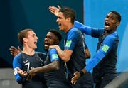 Jubelnde Gesichter bei den französischen Spielern. (Bild: Keystone)