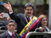 Die Opposition in Venezuela beklagt einen Einbruch der Volkswirtschaft in dem von Nicolás Maduro geführten Land. (Bild: KEYSTONE/AP/ARIANA CUBILLOS)