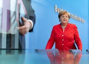 Angela Merkel tritt vor die Medienschaffenden im Haus der Bundespressekonferenz.Bild: Hayoung Jeon/EPA (Berlin, 20. Juli 2018)