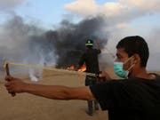 Waffenstillstand angekündigt: Nach einer Eskalation der Gewalt zwischen Israelis und Palästinensern am Freitag sollen die Waffen vorerst schweigen. (Bild: KEYSTONE/AP/ADEL HANA)