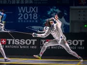   Max Heinzer (right) crowned Switzerland team world champion (Image: KEYSTONE / EPA / ALEKSANDAR PLAVEVSKI) 