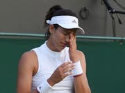 Als Vorjahressiegerin schon in der 2. Runde ausgeschieden - das tut Garbiñe Muguruza weh (Bild: KEYSTONE/EPA/GERRY PENNY)