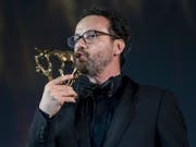 Der abtretende Direktor vom Filmfestival von Locarno, Carlo Chatrian, ist am Samstagabend mit einem Spezial-Leoparden geehrt worden. (Bild: KEYSTONE/ALEXANDRA WEY)