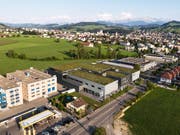 Der geplante Neubau der GNG in Langfeld, nördlich der Gossauer Stadtwerke, beeindruckt durch seine Grösse. (Visualisierungen: HRS)