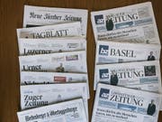 Die Wettbewerbshüter haben grünes Licht für den Zusammenschluss von NZZ-Mediengruppe und AZ Medien gegeben. (Bild: KEYSTONE/CHRISTIAN BEUTLER)