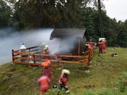 Die Einsatzkräfte brachten das Feuer rasch unter Kontrolle. (Bild: Kapo GR)