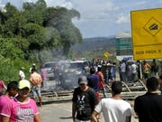 An der Grenze zwischen Brasilien und Venezuela sollen nach Ausschreitungen nun auch brasilianische Soldaten für Ordnung und Sicherheit sorgen. (Bild: KEYSTONE/EPA EFE/GERALDO MAIA)