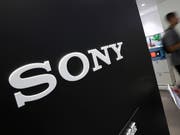Als Dankeschön für die Fans lanciert Sony eine limitierte Edition der Playstation 4. (Bild: KEYSTONE/AP/EUGENE HOSHIKO)