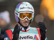 Kilian Peier ist nach der Landung mit seinem Sprung zufrieden (Bild: KEYSTONE/URS FLUEELER)